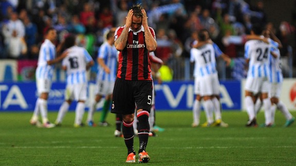 Philippe Mexes shows his frustration as AC Milan suffer defeat in Malaga
