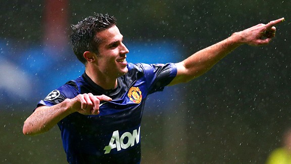 Robin van Persie celebrates the first of Man United's trio of goals as they came from behind to win at Braga