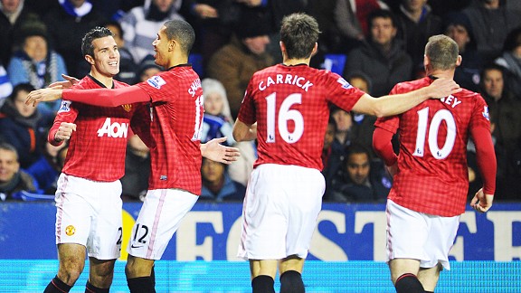 Man United celebrate after Robin Van Persie put them 4-3 up at Reading