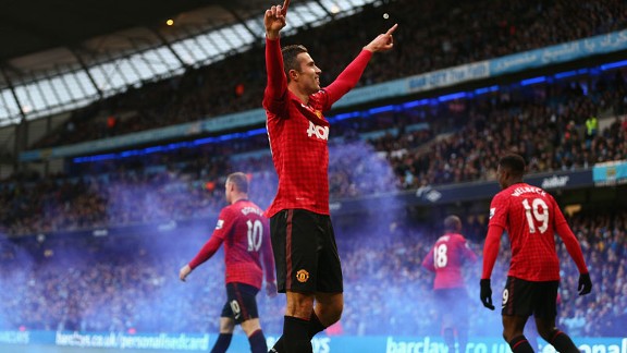 A jubilant Robin van Persie celebrates his derby-winning goal