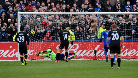 Jordi Gomez puts Wigan ahead at Macclesfield from the penalty spot