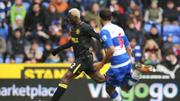 Arouna Kone prepares to score his second goal for Wigan against Reading