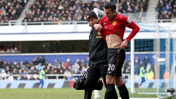 Robin van Persie is forced to depart Manchester United's game against QPR through injury
