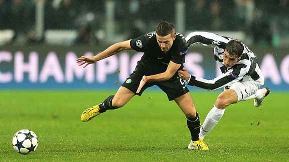 Adam Matthews tussles with Federico Peluso