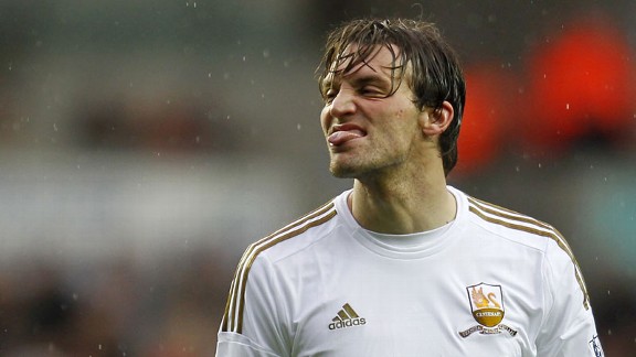 Michu reacts after missing a chance to give Swansea the lead over Arsenal