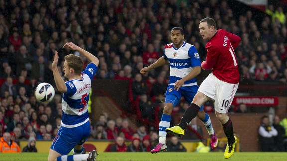 Wayne Rooney scores for a lacklustre Manchester United in their Premier League victoryagainst Reading
