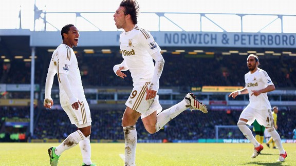 Michu celebrates after scoring for Swansea against Norwich