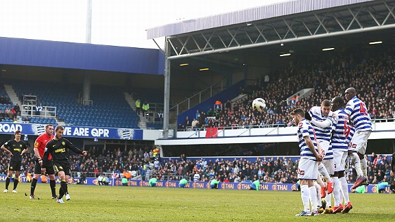 Adel Taarabt ducks out of the way, allowing Shaun Maloney's 94th-minute free-kick to find the back of the net and give Wigan a point