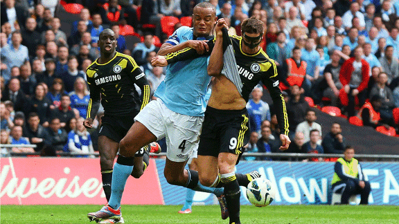 Fernando Torres wrestled by Vincent Kompany Man City v Chelsea Wembley