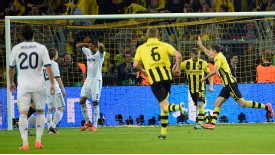 Real Madrid stand dejected as Lewandowski celebrates another goal