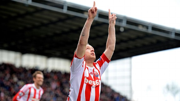 Charlie Adam celebrates giving Stoke the lead against Norwich