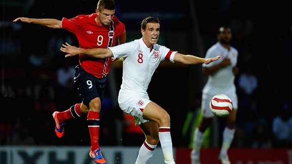 Valon Berisha, one of the most exciting prospects in Norway, battles with England's Jordan Henderson.