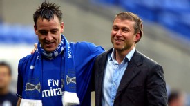 John Terry is congratulated by Abramovich after securing Chelsea's first Premier League title in 50 years