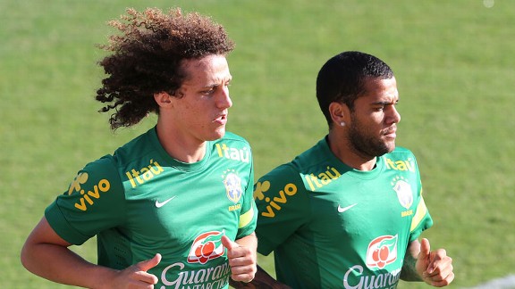 Chelsea's David Luiz alongside Barcelona's Dani Alves.