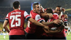 Arsenal celebrate Aaron Ramsey's goal which put the Gunners two up