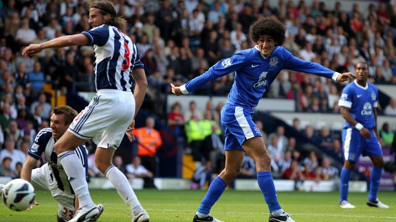 Gareth McAuley and Jonas Olssen and Marouane Fellaini battle Everton v West Brom