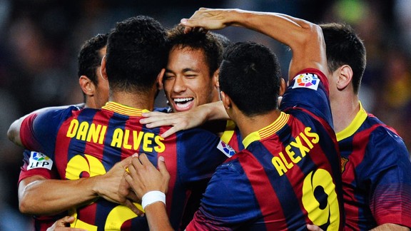 Neymar celebrates with his Barcelona team-mates after opening the scoring.