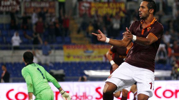 Roma's Mehdi Benatia his goal against Bologna.