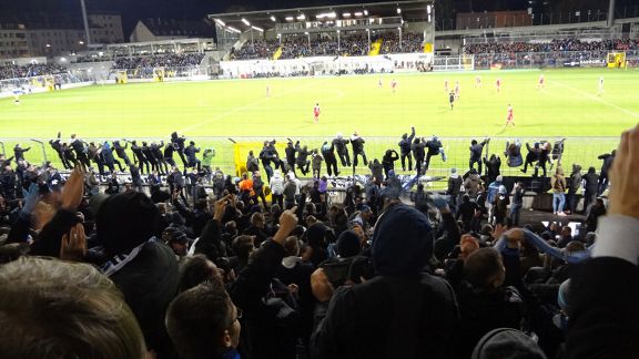 1860 Munich fans celebrate following their goal against Bayern Munich II.