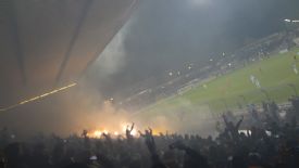 Flares are lit in the 1860 Munich II stand.