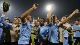 Uruguay celebrate their World Cup qualification victory over Jordan.