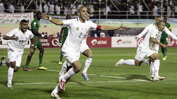 Madjid Bougherra celebrates after his goal sent Algeria to the World Cup finals.