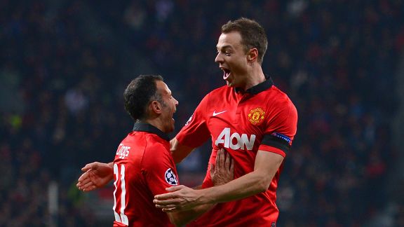 Jonny Evans celebrates United's third goal against Leverkusen