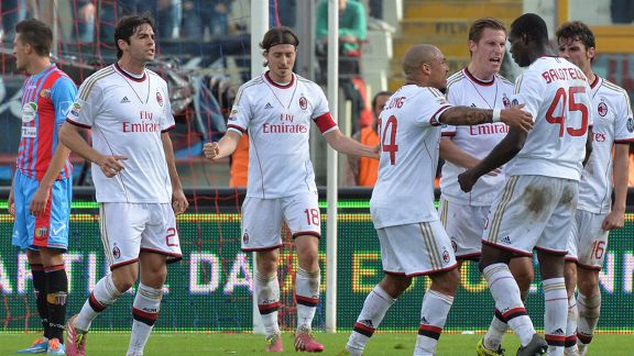 Mario Balotelli is congratulated on his goal for Milan against Catania.