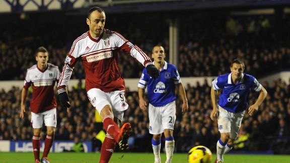 DImitar Berbatov scores a penalty for Fulham at Everton.