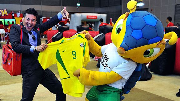 The mascot of the FIFA Brazil 2014 World Cup, Fuleco, poses during the FIFA World Cup trophy tour