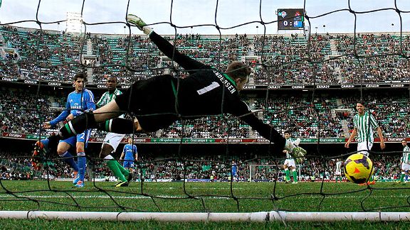 Alvaro Morata scores Real Madrid's fifth in their rout of Real Betis.