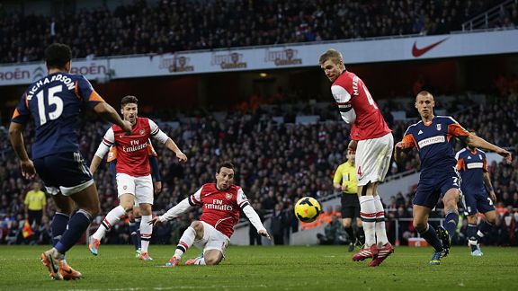 Santi Cazorla scores his first goal against Fulham.