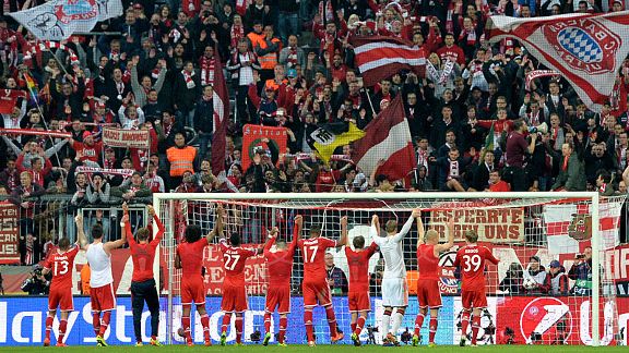 Bayern Munich players salute their fans after overcoming Man United.