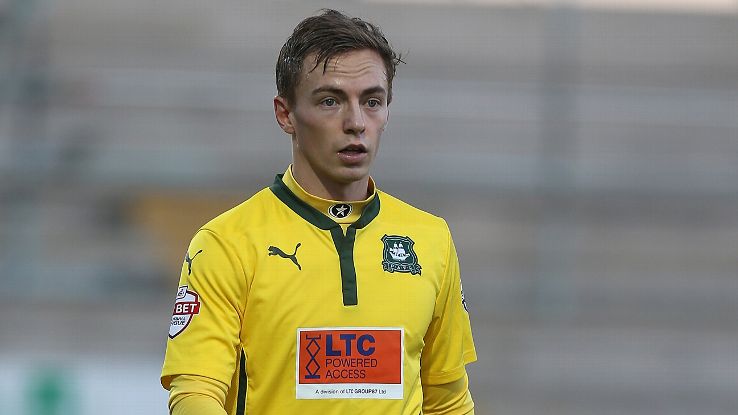 Manchester United sign defender ANDY KELLETT on loan from Bolton.