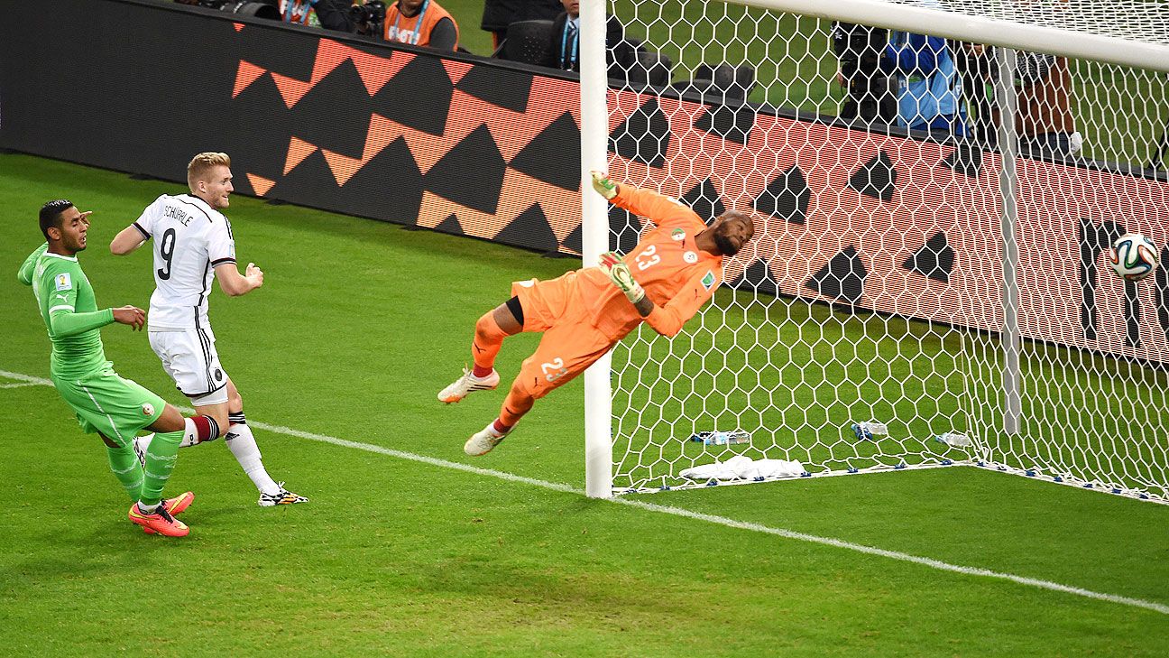 Germany battle to win over Algeria in World Cup round of