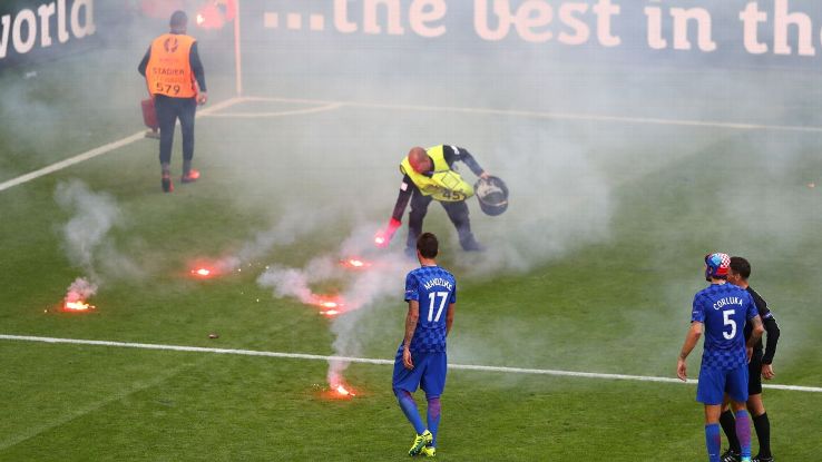 Croatia fans threw flares on the pitch in the 86th minute.