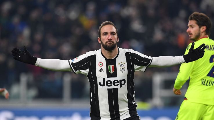 Gonzalo Higuain celebrates after opening the scoring.