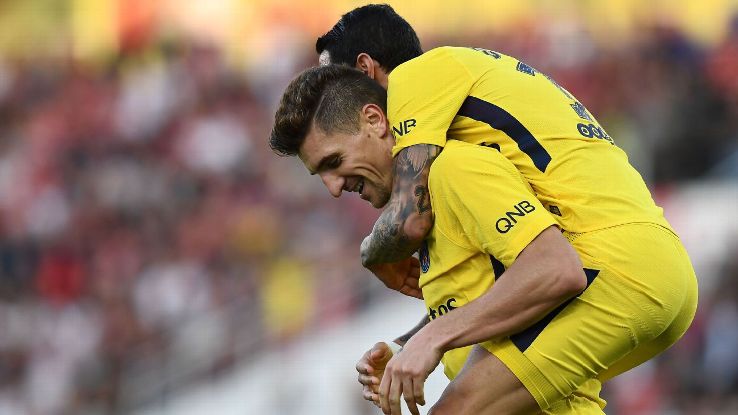 Thomas Meunier and Angel Di Maria celebrate after scoring a goal against Dijon.