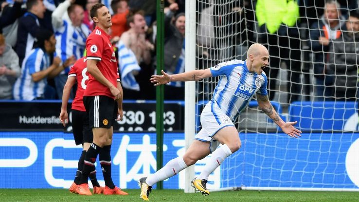 Huddersfield's Aaron Mooy celebrates scoring opening goal in win over Manchester United