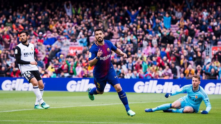 Luis Suarez scored the opening goal in Barcelona's win over Valencia.