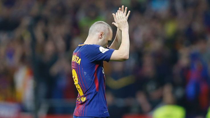 Andres Iniesta applauds to the fans after exiting Barcelona's Copa del Rey win against Sevilla.