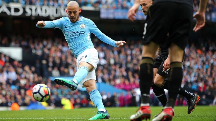David Silva scores Manchester City's opening goal during their Premier League game against Swansea.