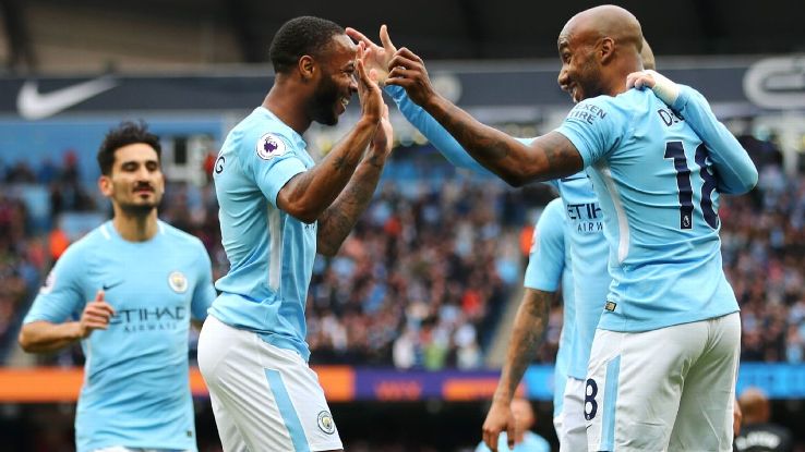 Raheem Sterling celebrates after scoring for Manchester City in their Premier League game against Swansea.