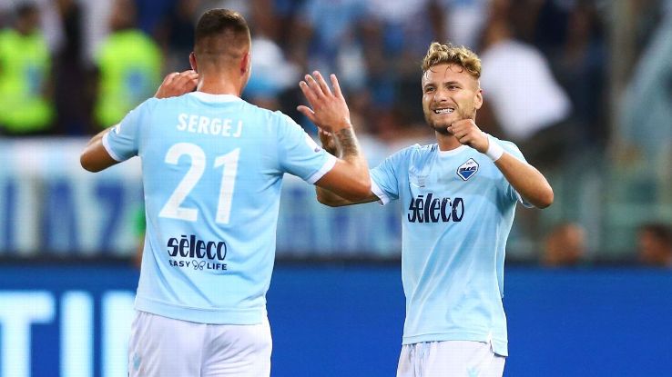 Sergej Milinkovic-Savic and Ciro Immobile celebrate during the Italian Super Cup match between Lazio and Juventus.