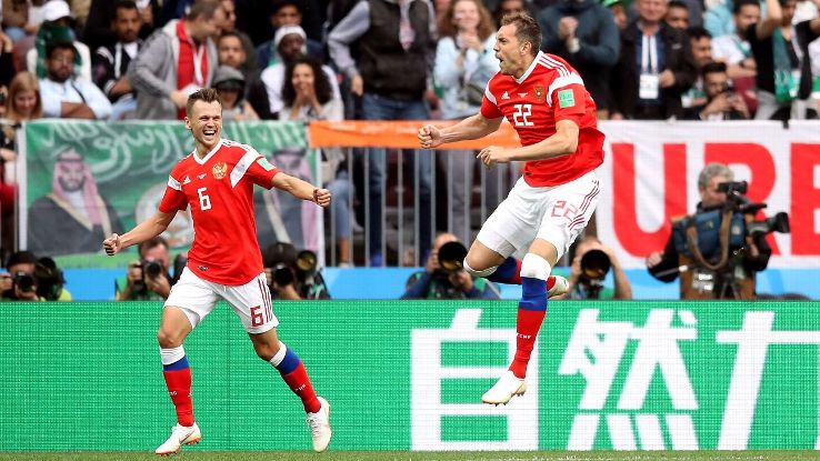   Denis Cheryshev, left, and Artem Dzyuba, right, were key players in the Russian quarterfinal surprise. 