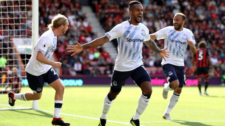 Theo Walcott of Everton celebrates his opener at Bournemouth.