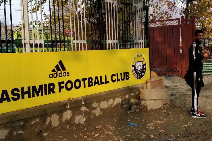 RKFC defender Muhammad Hammad stands outside the stadium after the game, waiting for his brother to pick him up. 