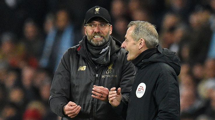 Liverpool manager Jurgen Klopp argues with the fourth official during their match against Manchester City.