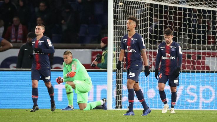Paris Saint-Germain players react during their Coupe de la Ligue loss to Guingamp.