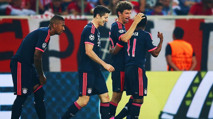 Thomas Muller, center right, continued his blistering form with a brace against Olympiakos.